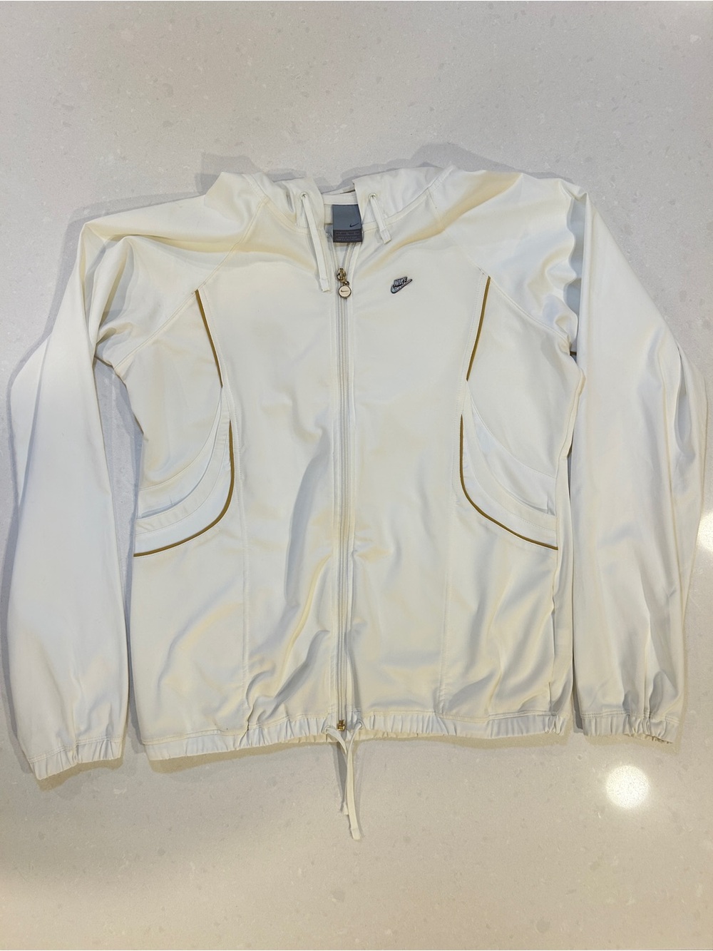 Nike Women's White Hooded Athletic Jacket with Gold Detailing